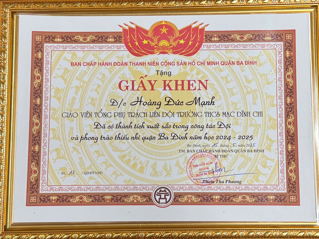 A certificate in a gold frame

AI-generated content may be incorrect.