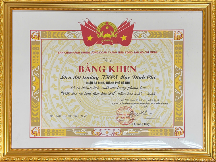 A certificate in a gold frame

AI-generated content may be incorrect.